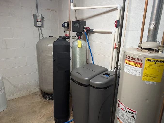 Greensand+ iron filter and catalytic carbon ahead of an existing water softener on a private well in Eureka, IL, installed by Water Air and You